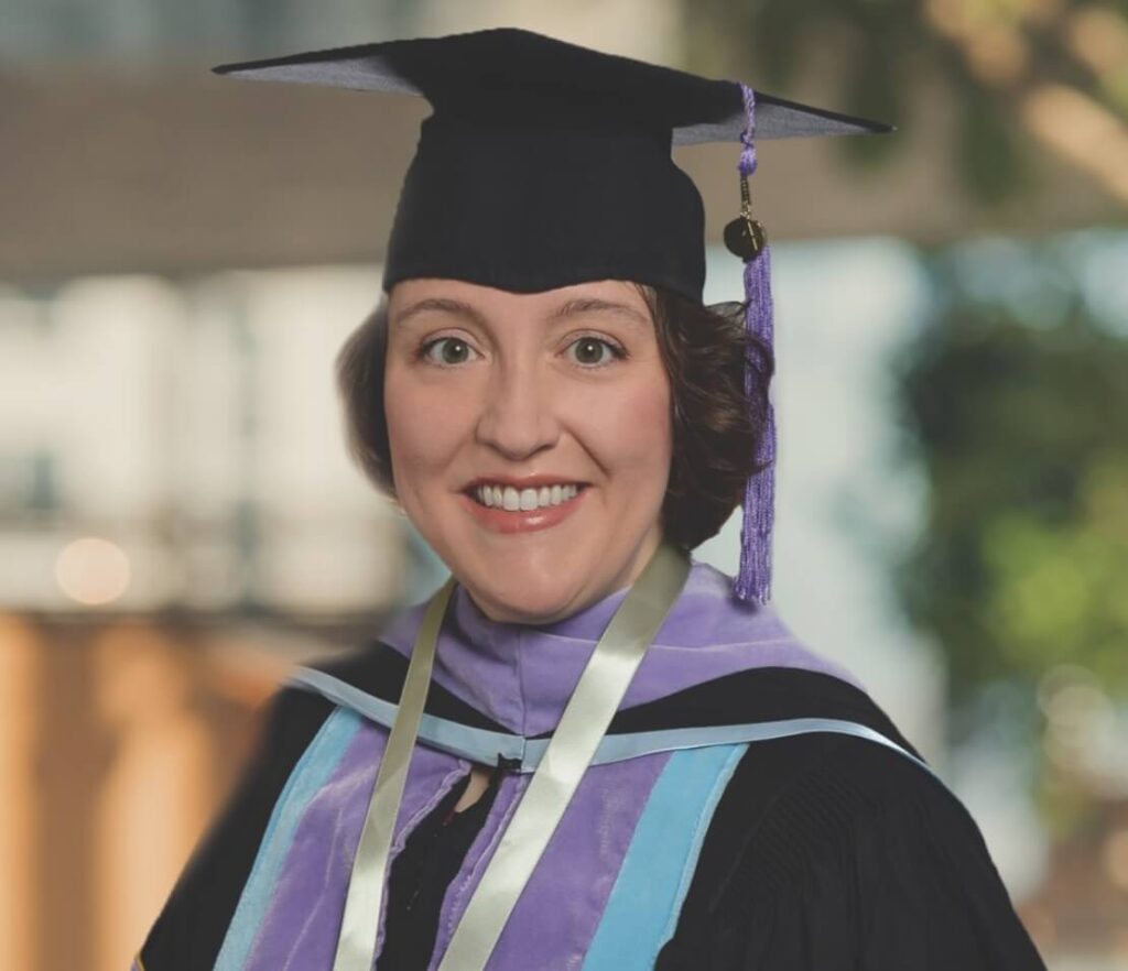 Dr. Jordan in a graduation cap and gown